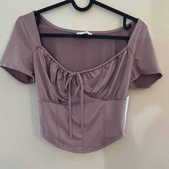 live in the moment Tops - NWOT Silky purple crop top, makes boobs look great